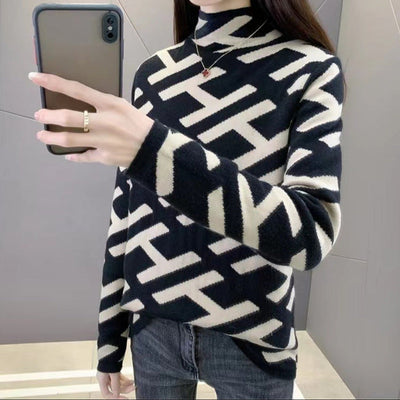 Geometric sweater with black alphabet