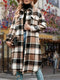 Elegant checked fleece coat for women - medium length, loose fit