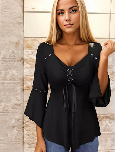 Black solid color top with V-neckline