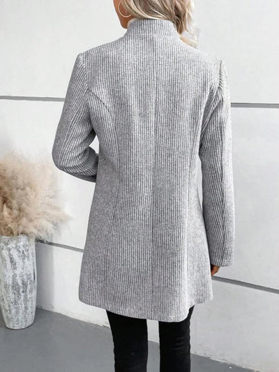 Gray solid color outerwear with long sleeves and pockets