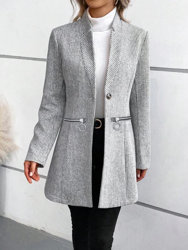 Gray solid color outerwear with long sleeves and pockets