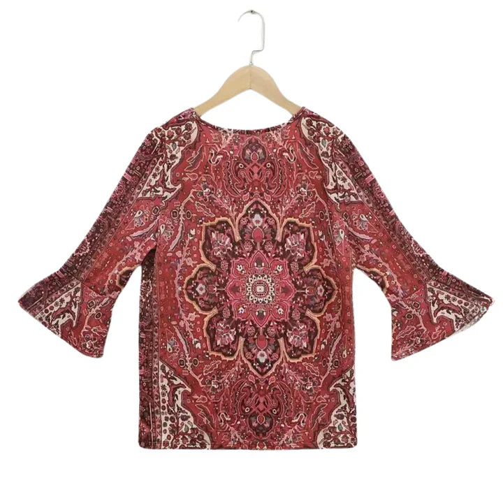 Red top with 3/4 length sleeves and V-neckline