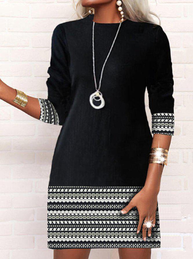 Black and white long-sleeved mini dress with Aztec pattern