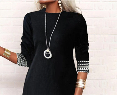 Black and white long-sleeved mini dress with Aztec pattern