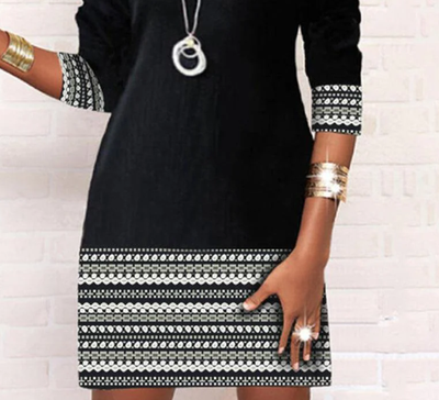 Black and white long-sleeved mini dress with Aztec pattern